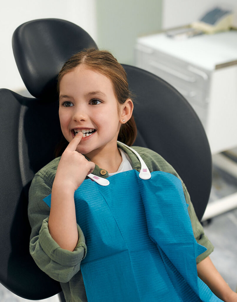 Child in dentist chair for invisalign consultation